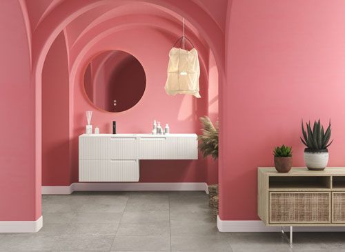 Modern mid century and minimalist bathroom interior, coral decor concept, modern white bathroom cabinet with coral wall on concrete floor